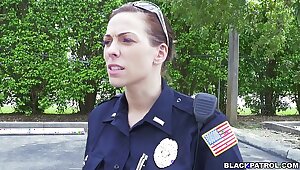 Female cops pull over black suspect and suck his cock